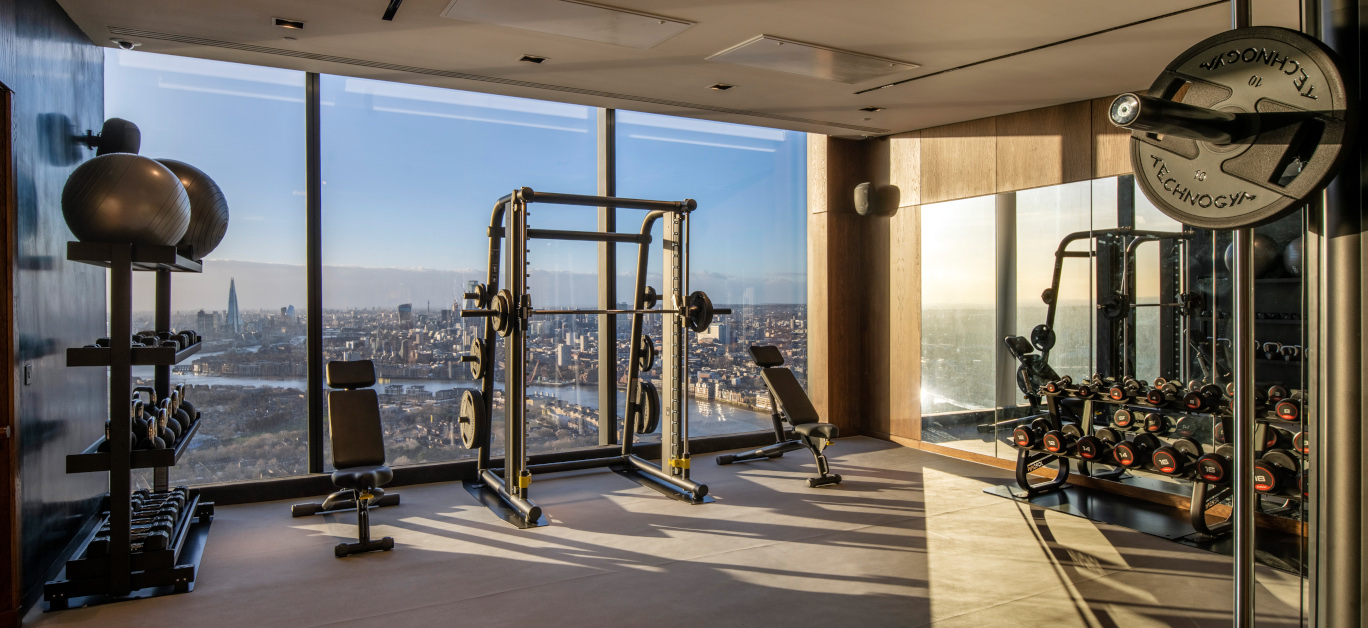 Landmark Pinnacle is home to the UK’s highest gym, located on the 56th floor and spans 2600 sq ft. 

Residents can exercise and relax 571 ft in the sky overlooking awe-inspiring West facing views over the River Thames and London’s skyline. The gym also offers residents a vast range of state-of-the-art Technogym equipment including a designated free weights area, group exercise studio for Pilates and yoga and much more to rival a five-star hotel or spa. 

Located in Canary Wharf and spanning 75 floors, the iconic Landmark Pinnacle offers residents breath-taking panoramic views of London’s iconic skyline. 

The residence also includes exceptional amenity spaces for residents to enjoy including a private cinema, dining spaces, and London’s highest private roof terrace on the 75th floor.  

Copyright: Chalegrove Properties Ltd and Tony Murray

www.landmarkpinnacle.com